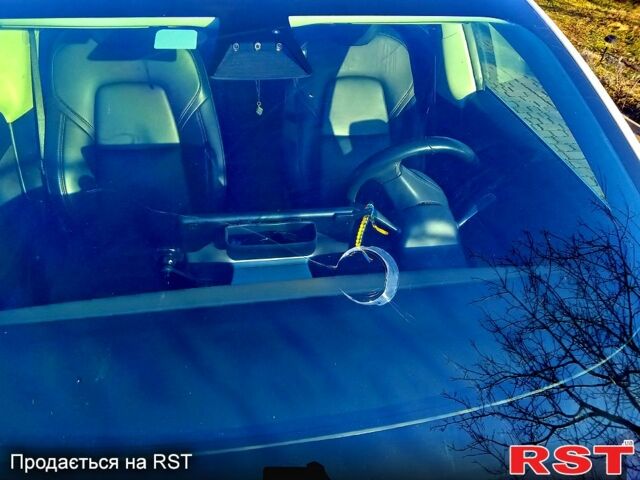 Белый Тесла Модель 3, объемом двигателя 0.14 л и пробегом 124 тыс. км за 20500 $, фото 5 на Automoto.ua