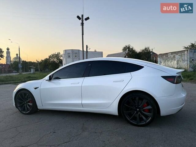 Белый Тесла Модель 3, объемом двигателя 0 л и пробегом 57 тыс. км за 21000 $, фото 34 на Automoto.ua