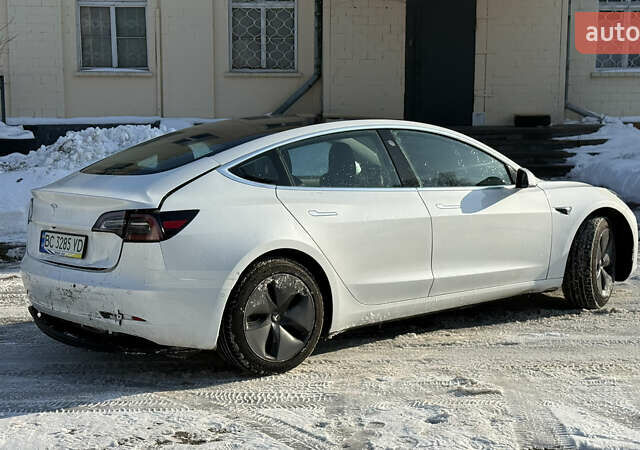 Белый Тесла Модель 3, объемом двигателя 0 л и пробегом 70 тыс. км за 13900 $, фото 7 на Automoto.ua