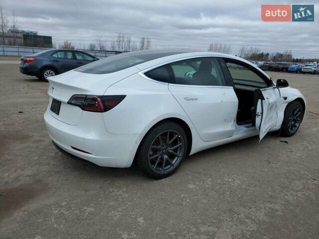 Білий Тесла Модель 3, об'ємом двигуна 0 л та пробігом 76 тис. км за 3000 $, фото 2 на Automoto.ua