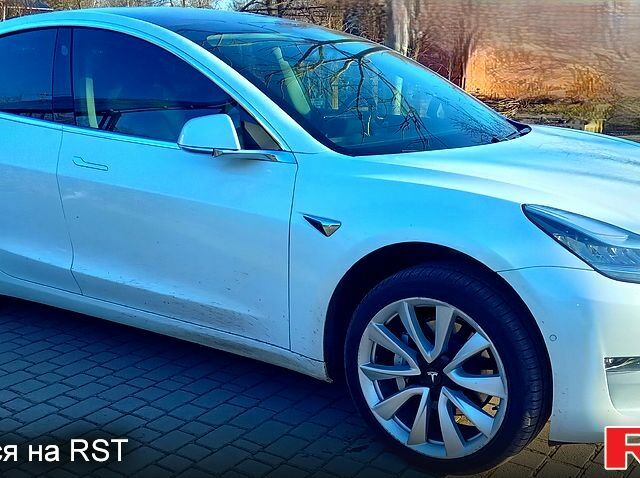 Белый Тесла Модель 3, объемом двигателя 0.14 л и пробегом 124 тыс. км за 20500 $, фото 2 на Automoto.ua