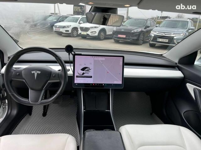 Білий Тесла Модель 3, об'ємом двигуна 0 л та пробігом 203 тис. км за 12000 $, фото 33 на Automoto.ua