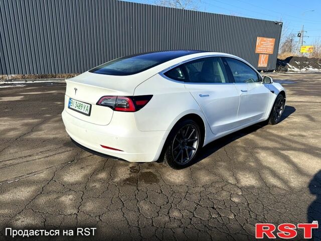 Белый Тесла Модель 3, объемом двигателя 0 л и пробегом 150 тыс. км за 15500 $, фото 2 на Automoto.ua