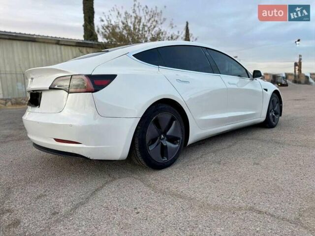 Белый Тесла Модель 3, объемом двигателя 0 л и пробегом 129 тыс. км за 4900 $, фото 3 на Automoto.ua