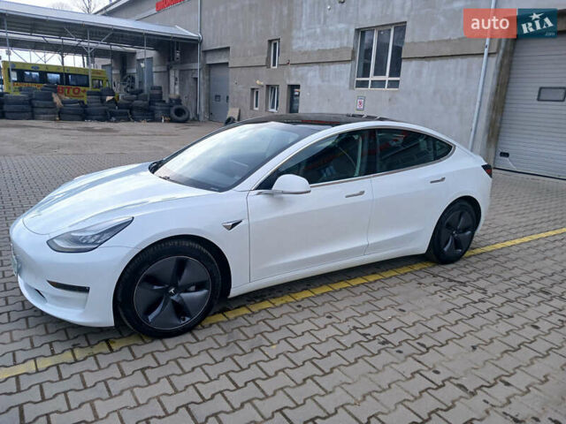 Білий Тесла Модель 3, об'ємом двигуна 0 л та пробігом 65 тис. км за 17700 $, фото 4 на Automoto.ua