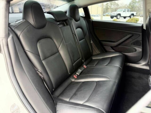 Белый Тесла Модель 3, объемом двигателя 0 л и пробегом 53 тыс. км за 12700 $, фото 16 на Automoto.ua