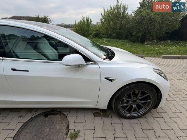 Белый Тесла Модель 3, объемом двигателя 0 л и пробегом 83 тыс. км за 18000 $, фото 8 на Automoto.ua