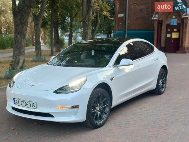 Білий Тесла Модель 3, об'ємом двигуна 0 л та пробігом 124 тис. км за 17300 $, фото 2 на Automoto.ua