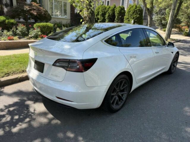 Білий Тесла Модель 3, об'ємом двигуна 0 л та пробігом 37 тис. км за 7800 $, фото 4 на Automoto.ua