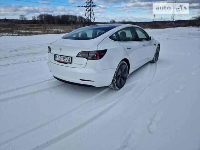 Белый Тесла Модель 3, объемом двигателя 0 л и пробегом 170 тыс. км за 15500 $, фото 2 на Automoto.ua