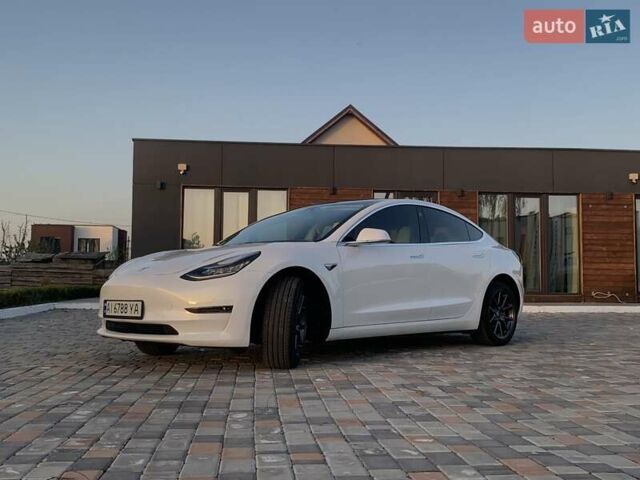 Белый Тесла Модель 3, объемом двигателя 0 л и пробегом 66 тыс. км за 15800 $, фото 2 на Automoto.ua