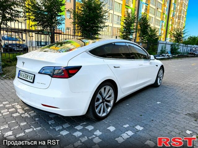 Білий Тесла Модель 3, об'ємом двигуна 0.32 л та пробігом 191 тис. км за 15400 $, фото 1 на Automoto.ua