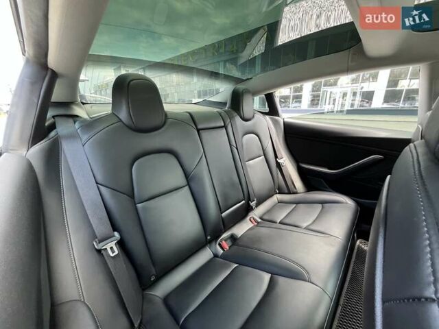 Белый Тесла Модель 3, объемом двигателя 0 л и пробегом 57 тыс. км за 18650 $, фото 24 на Automoto.ua