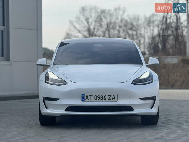 Белый Тесла Модель 3, объемом двигателя 0 л и пробегом 70 тыс. км за 15500 $, фото 2 на Automoto.ua