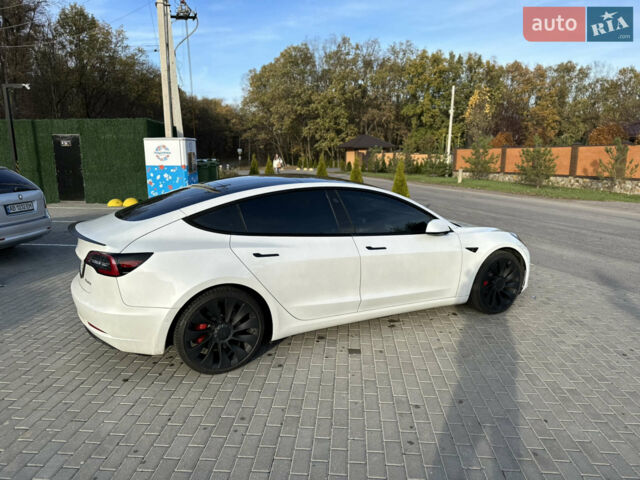 Белый Тесла Модель 3, объемом двигателя 0 л и пробегом 77 тыс. км за 28999 $, фото 24 на Automoto.ua