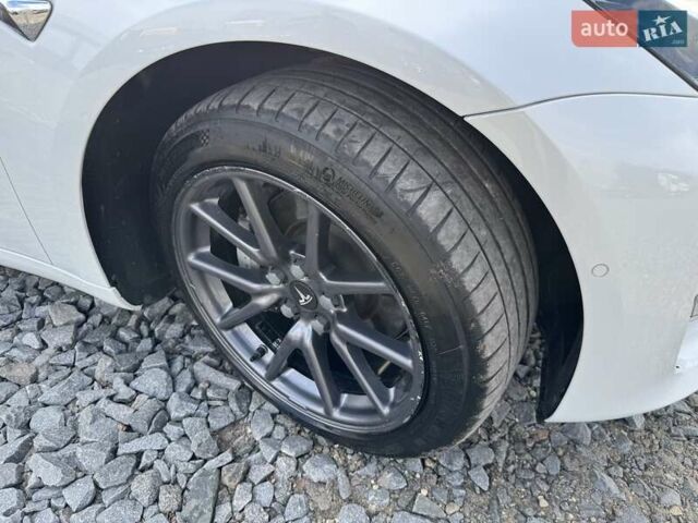 Белый Тесла Модель 3, объемом двигателя 0 л и пробегом 130 тыс. км за 17950 $, фото 46 на Automoto.ua