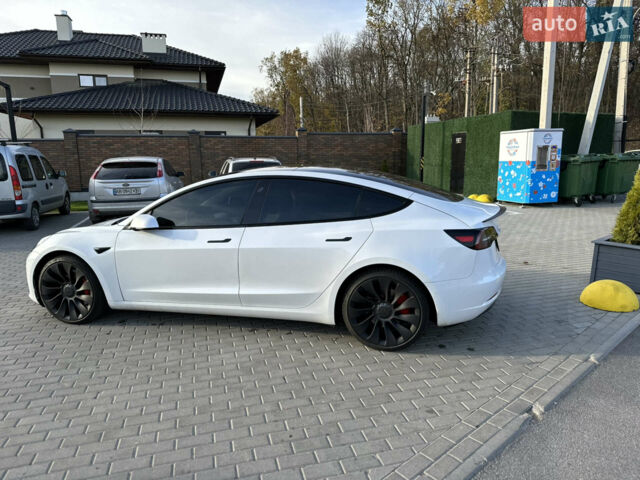 Белый Тесла Модель 3, объемом двигателя 0 л и пробегом 77 тыс. км за 28999 $, фото 6 на Automoto.ua