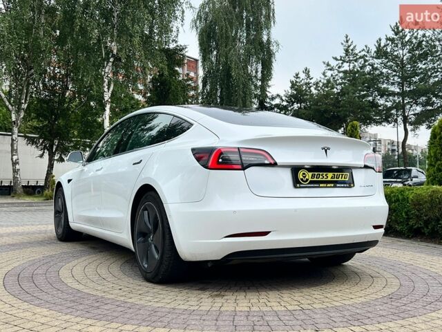 Білий Тесла Модель 3, об'ємом двигуна 0 л та пробігом 123 тис. км за 17300 $, фото 4 на Automoto.ua