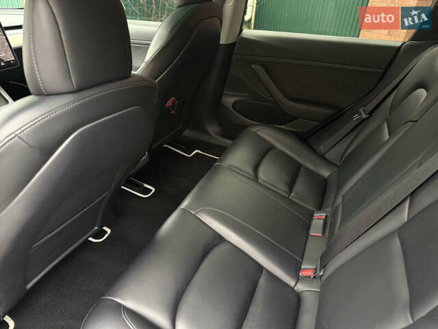 Белый Тесла Модель 3, объемом двигателя 0 л и пробегом 65 тыс. км за 16900 $, фото 8 на Automoto.ua