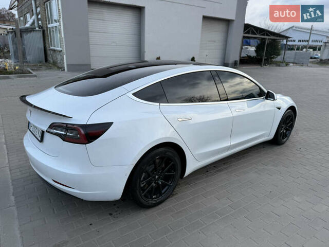 Білий Тесла Модель 3, об'ємом двигуна 0 л та пробігом 84 тис. км за 20500 $, фото 4 на Automoto.ua