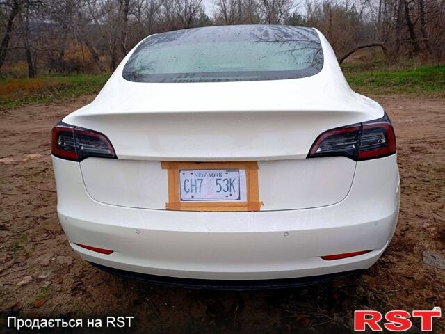 Белый Тесла Модель 3, объемом двигателя 75 л и пробегом 77 тыс. км за 16000 $, фото 7 на Automoto.ua