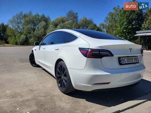 Белый Тесла Модель 3, объемом двигателя 0 л и пробегом 90 тыс. км за 16000 $, фото 2 на Automoto.ua
