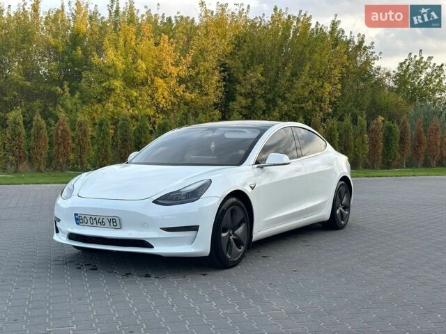 Белый Тесла Модель 3, объемом двигателя 0 л и пробегом 125 тыс. км за 17700 $, фото 1 на Automoto.ua