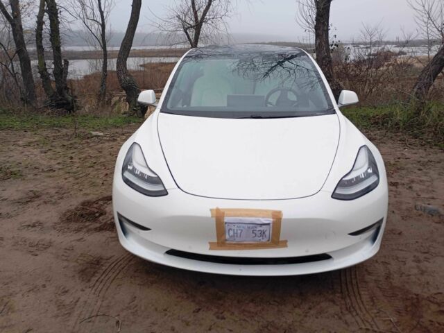 Белый Тесла Модель 3, объемом двигателя 0 л и пробегом 77 тыс. км за 16000 $, фото 1 на Automoto.ua