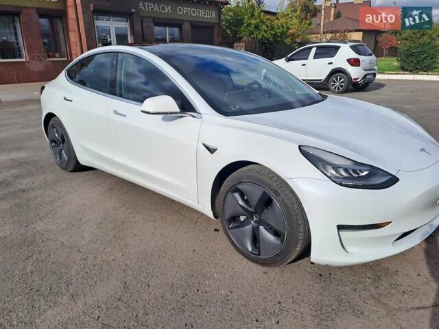 Білий Тесла Модель 3, об'ємом двигуна 0 л та пробігом 81 тис. км за 16500 $, фото 2 на Automoto.ua