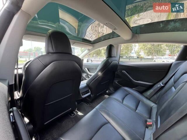 Белый Тесла Модель 3, объемом двигателя 0 л и пробегом 57 тыс. км за 18650 $, фото 27 на Automoto.ua
