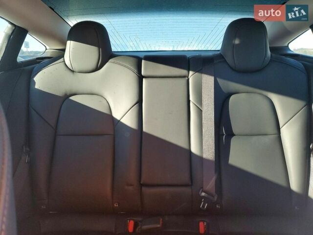 Білий Тесла Модель 3, об'ємом двигуна 0 л та пробігом 81 тис. км за 4500 $, фото 3 на Automoto.ua