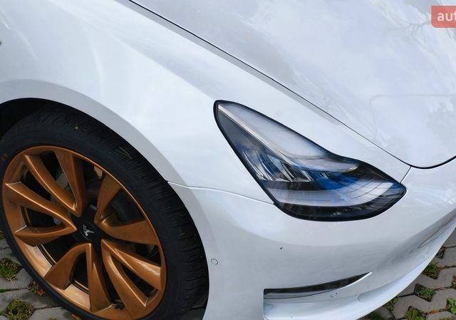 Білий Тесла Модель 3, об'ємом двигуна 0 л та пробігом 58 тис. км за 18800 $, фото 4 на Automoto.ua