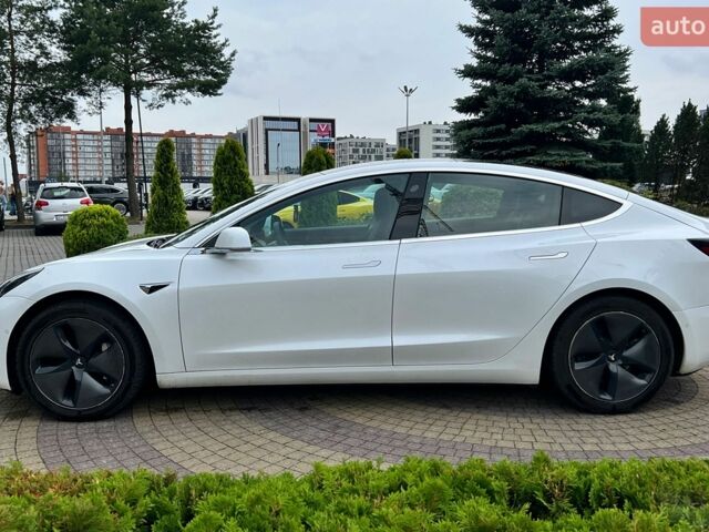 Білий Тесла Модель 3, об'ємом двигуна 0 л та пробігом 123 тис. км за 17300 $, фото 3 на Automoto.ua