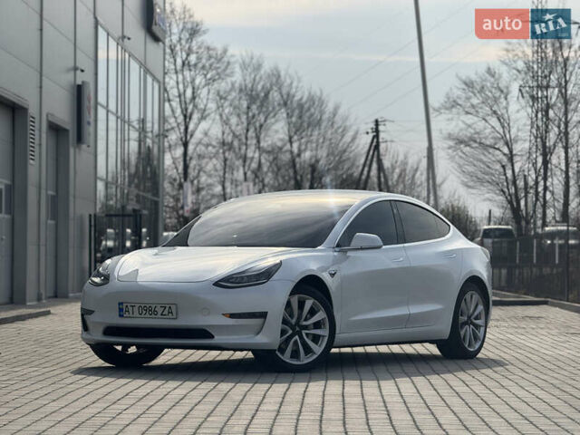Белый Тесла Модель 3, объемом двигателя 0 л и пробегом 70 тыс. км за 15500 $, фото 1 на Automoto.ua