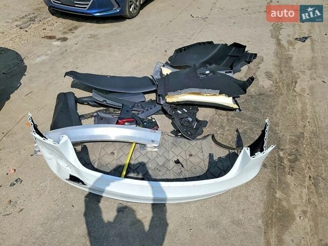 Белый Тесла Модель 3, объемом двигателя 0 л и пробегом 78 тыс. км за 6500 $, фото 11 на Automoto.ua