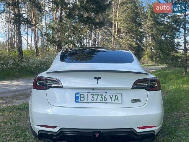 Белый Тесла Модель 3, объемом двигателя 0 л и пробегом 76 тыс. км за 19800 $, фото 3 на Automoto.ua