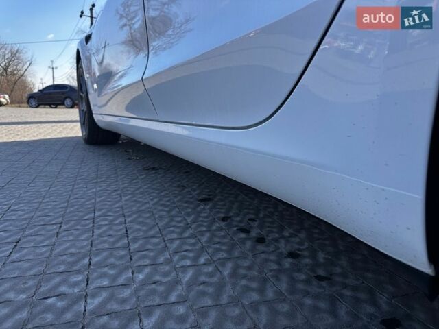 Білий Тесла Модель 3, об'ємом двигуна 0 л та пробігом 65 тис. км за 17950 $, фото 11 на Automoto.ua