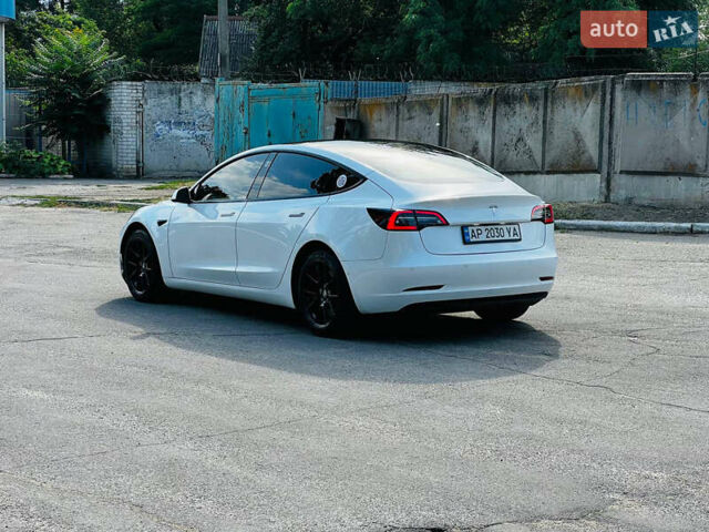 Белый Тесла Модель 3, объемом двигателя 0 л и пробегом 58 тыс. км за 18000 $, фото 3 на Automoto.ua