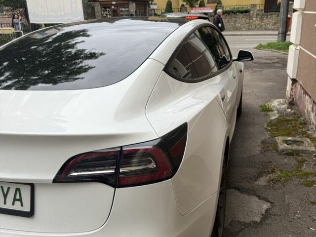 Білий Тесла Модель 3, об'ємом двигуна 0 л та пробігом 77 тис. км за 17800 $, фото 2 на Automoto.ua