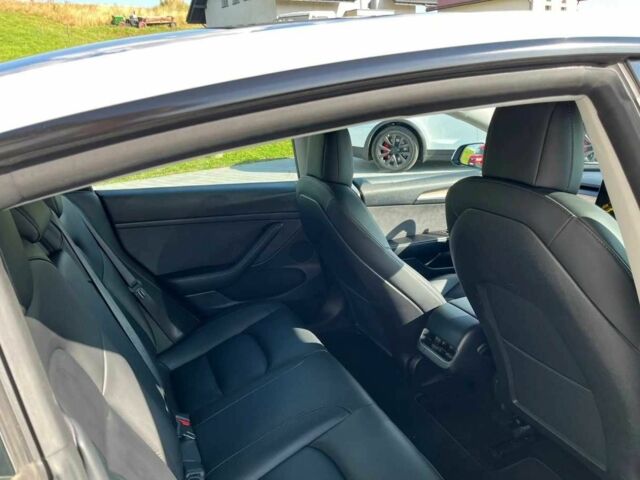 Білий Тесла Модель 3, об'ємом двигуна 0 л та пробігом 82 тис. км за 12600 $, фото 1 на Automoto.ua