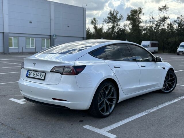 Білий Тесла Модель 3, об'ємом двигуна 0 л та пробігом 73 тис. км за 16600 $, фото 3 на Automoto.ua