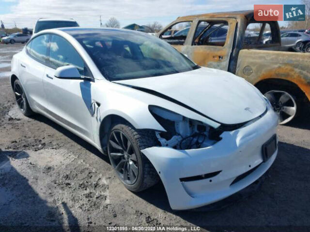 Білий Тесла Модель 3, об'ємом двигуна 0 л та пробігом 59 тис. км за 12800 $, фото 1 на Automoto.ua