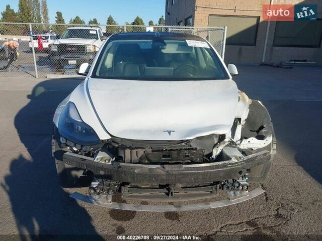 Белый Тесла Модель 3, объемом двигателя 0 л и пробегом 94 тыс. км за 21800 $, фото 58 на Automoto.ua