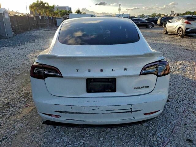 Белый Тесла Модель 3, объемом двигателя 0 л и пробегом 70 тыс. км за 5500 $, фото 5 на Automoto.ua