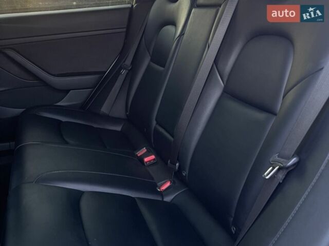 Білий Тесла Модель 3, об'ємом двигуна 0 л та пробігом 83 тис. км за 20700 $, фото 17 на Automoto.ua