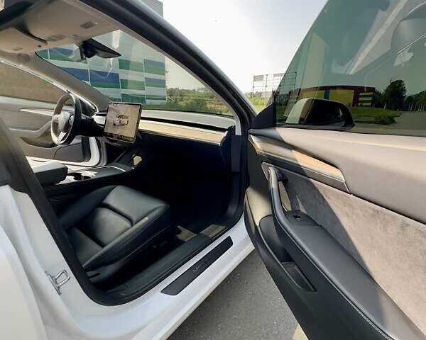 Белый Тесла Модель 3, объемом двигателя 0 л и пробегом 65 тыс. км за 22000 $, фото 14 на Automoto.ua