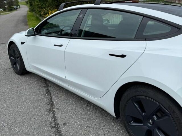 Белый Тесла Модель 3, объемом двигателя 0 л и пробегом 42 тыс. км за 13000 $, фото 1 на Automoto.ua