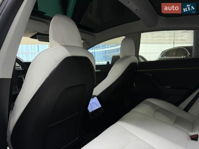 Білий Тесла Модель 3, об'ємом двигуна 0 л та пробігом 88 тис. км за 20900 $, фото 23 на Automoto.ua