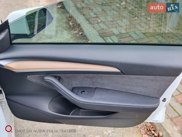 Білий Тесла Модель 3, об'ємом двигуна 0 л та пробігом 74 тис. км за 17900 $, фото 13 на Automoto.ua