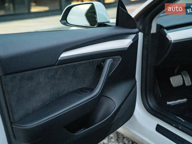 Белый Тесла Модель 3, объемом двигателя 0 л и пробегом 53 тыс. км за 27500 $, фото 33 на Automoto.ua